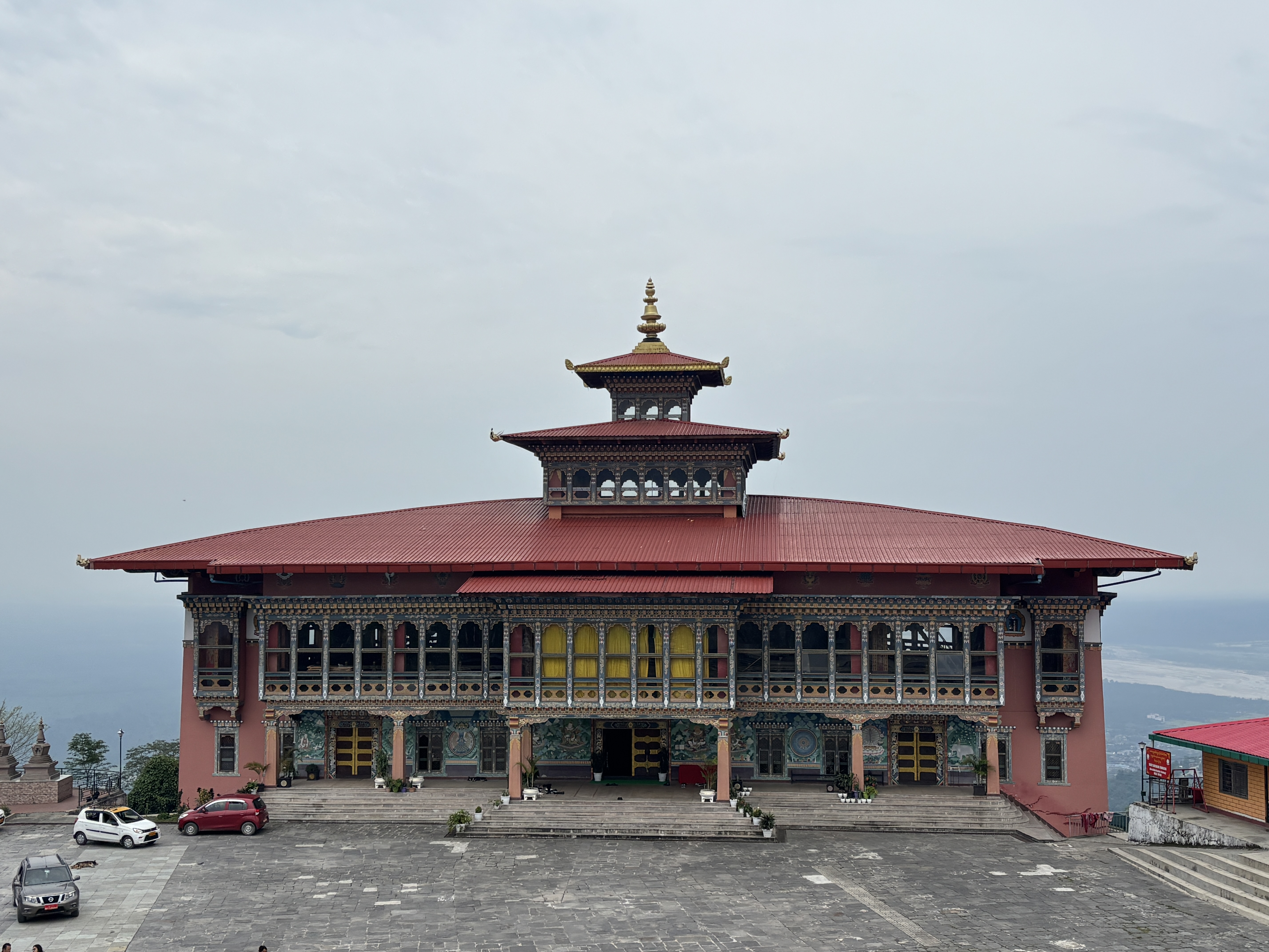 The extended Sangye Migyur Ling Lhakhang with a huge statue of Milarepa