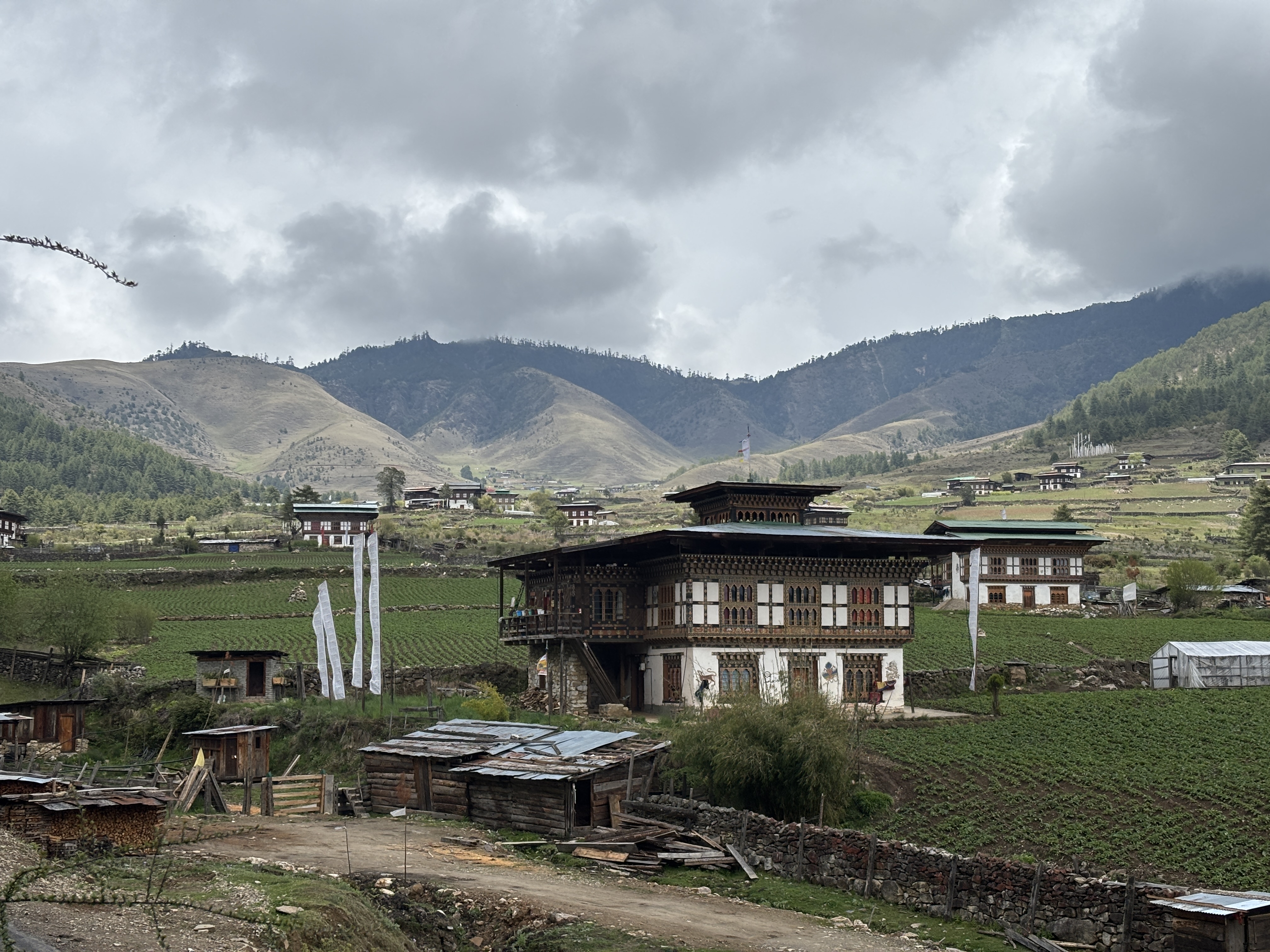 A traditional Bhutanese home tucked into the valley