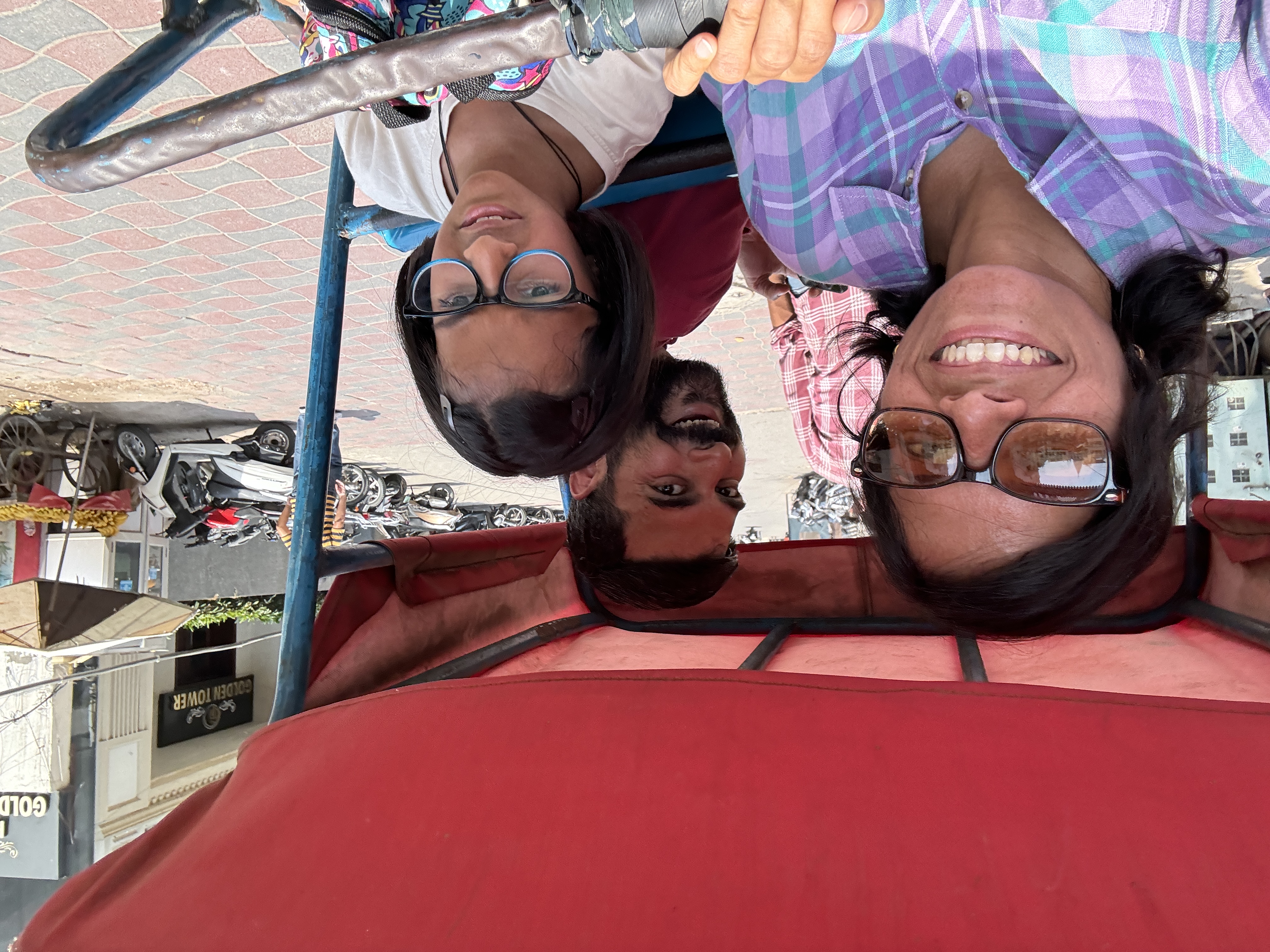 The rickshaw to beat the intense sun breathing fire on us
