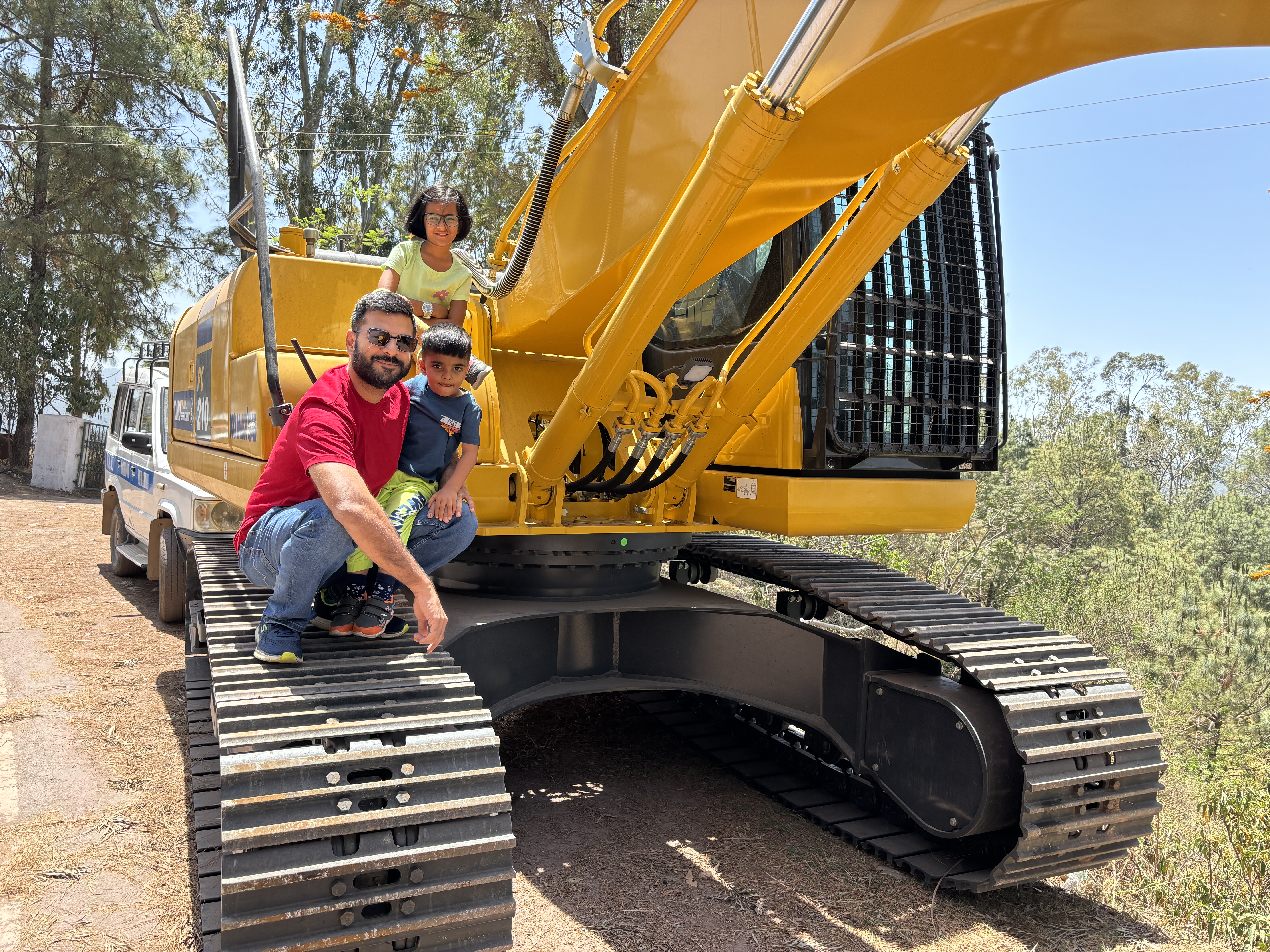 Snapshotting outsleves with an idle crane on the roadside