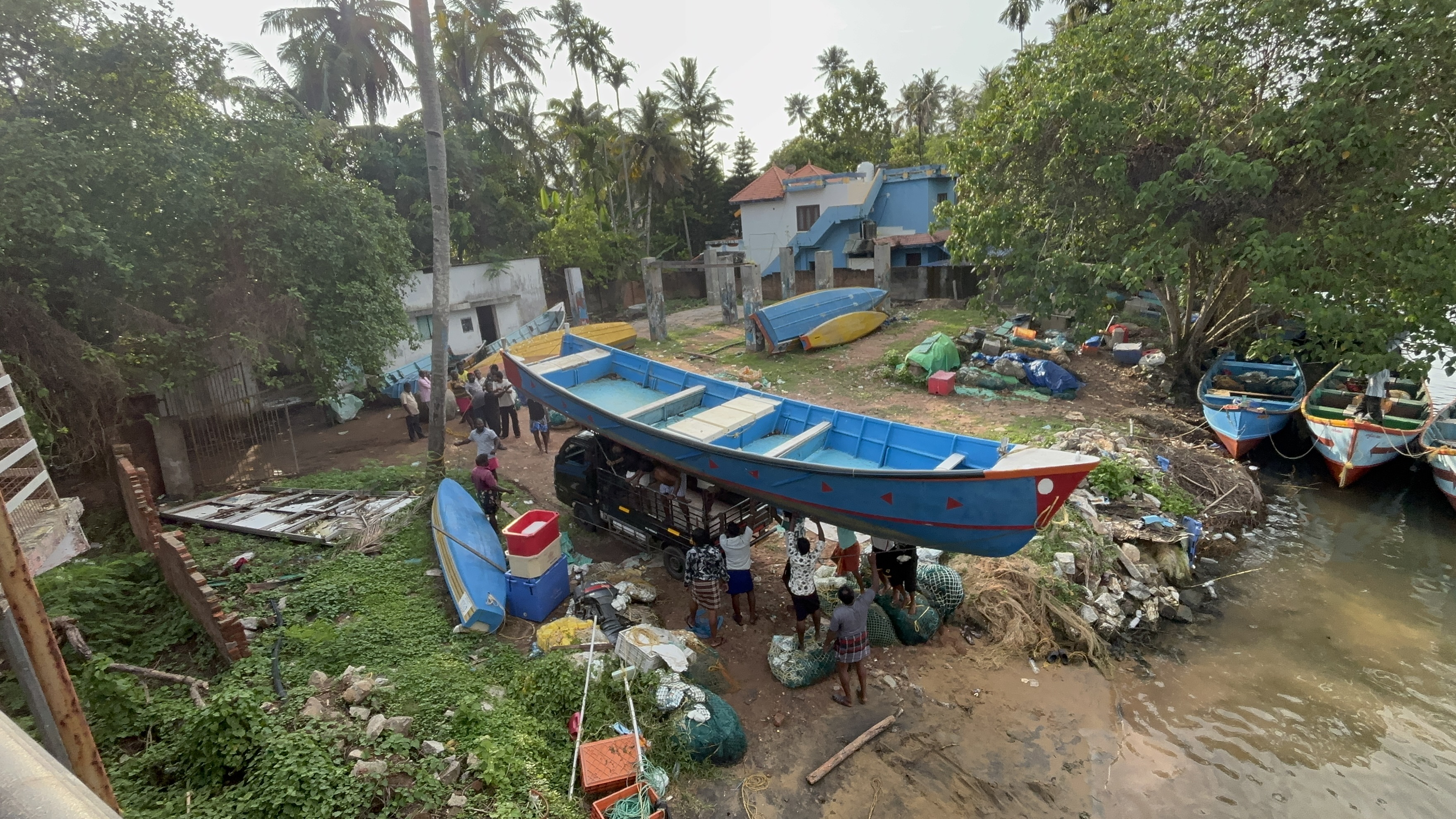 A boat being loaded on the beach