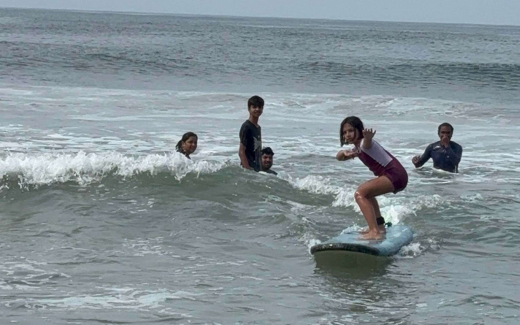 The kids try surfing