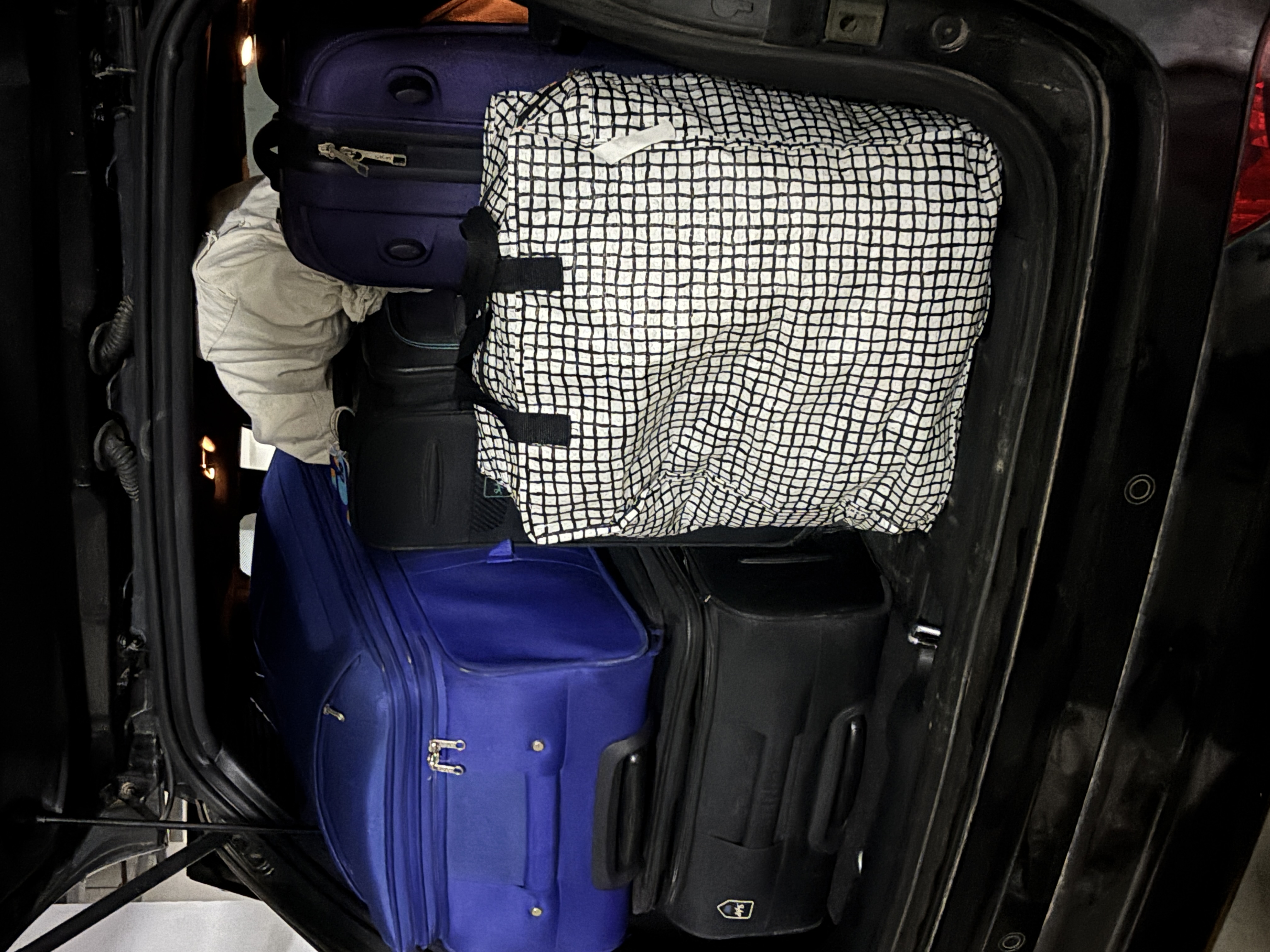 Playing tetris with the luggage in the boot