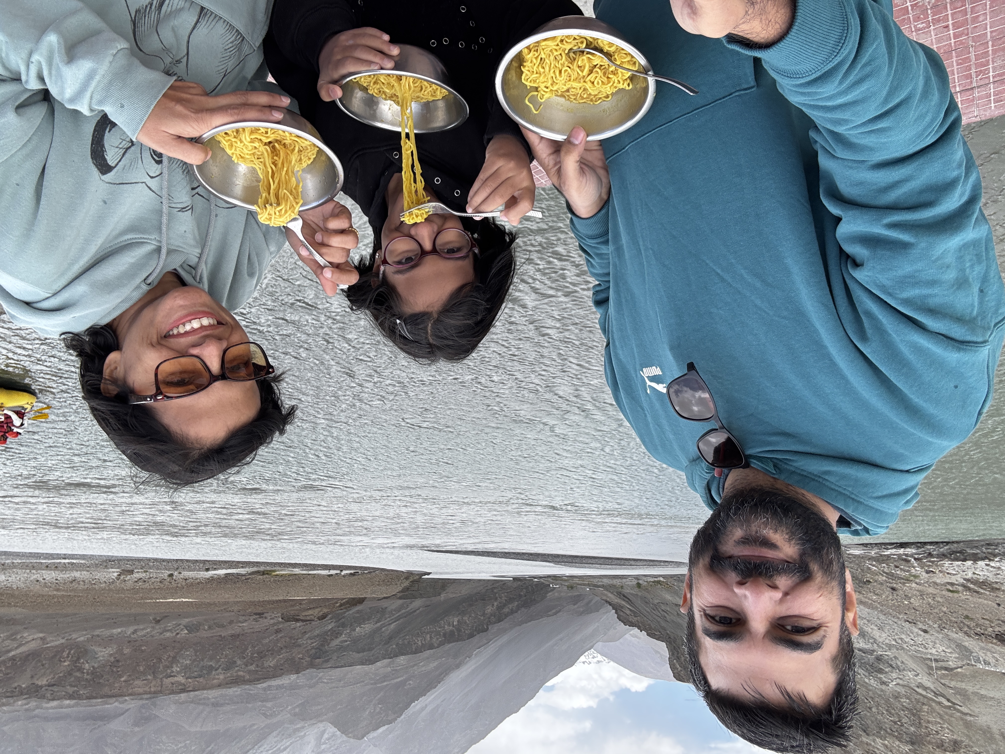 Enjoying Maggi noodles by the river confluence