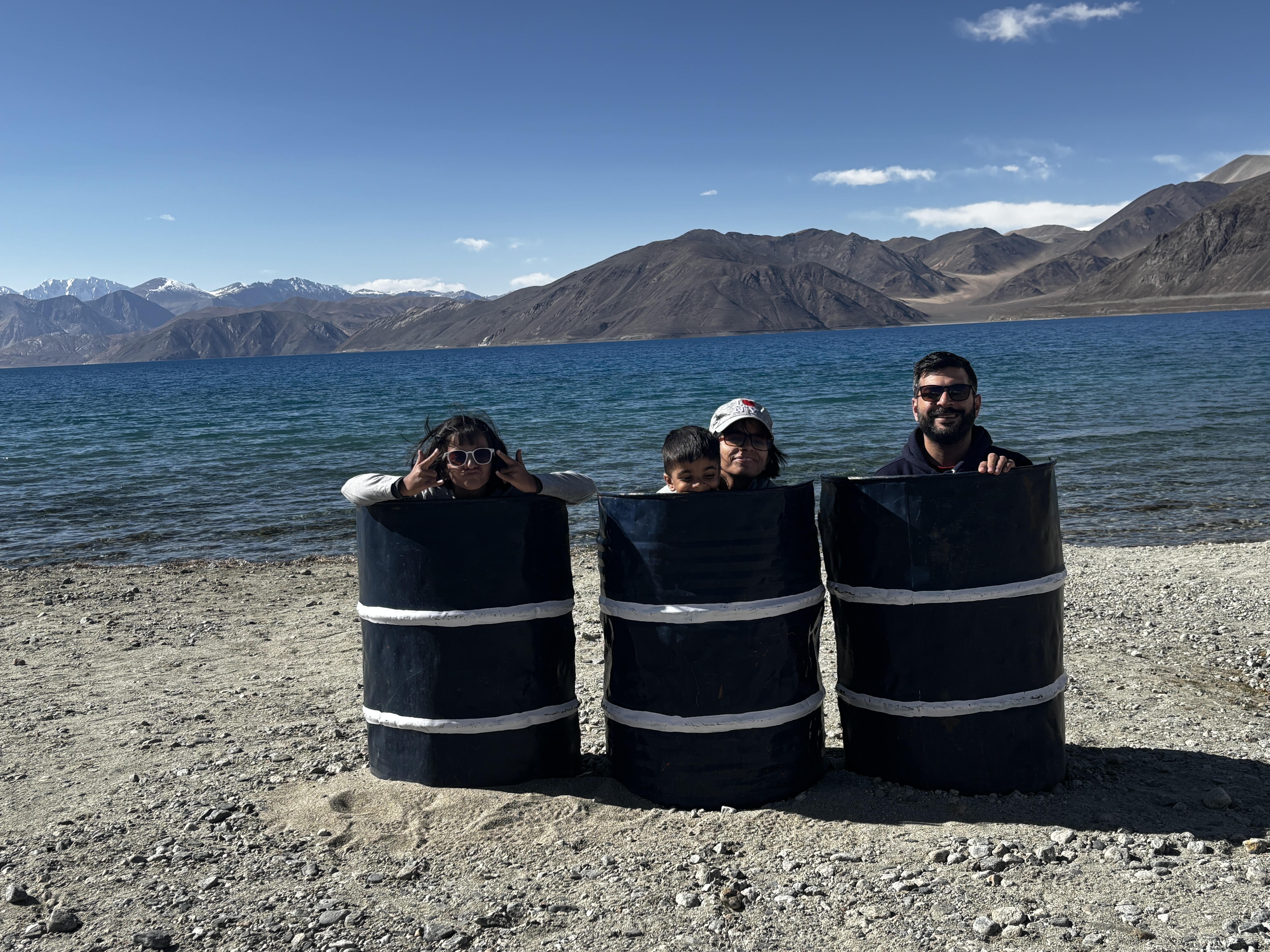 Posing around Pangong Tso with drums