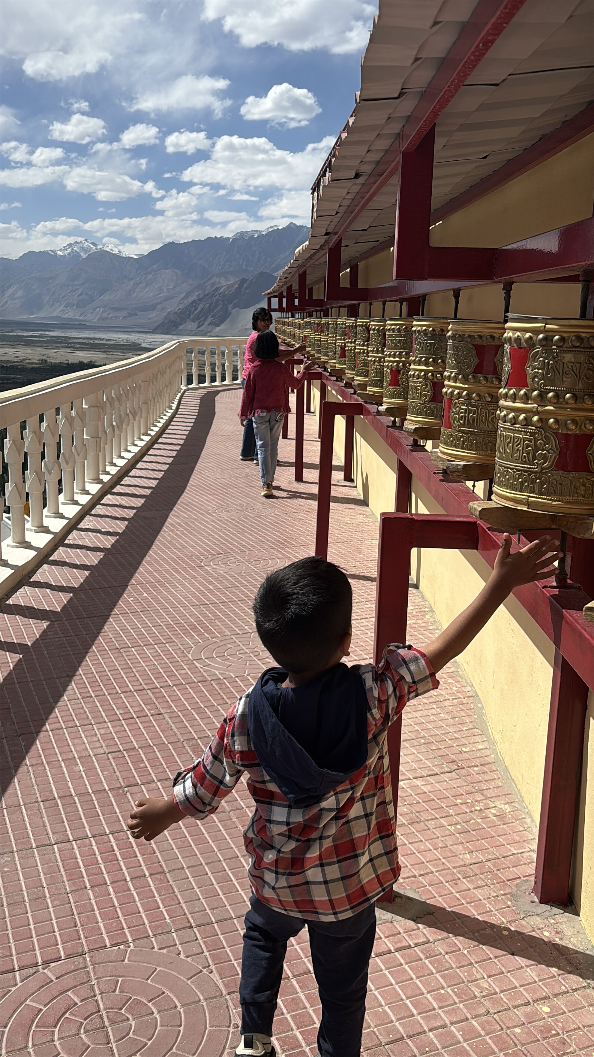 Prayer wheels at the temple