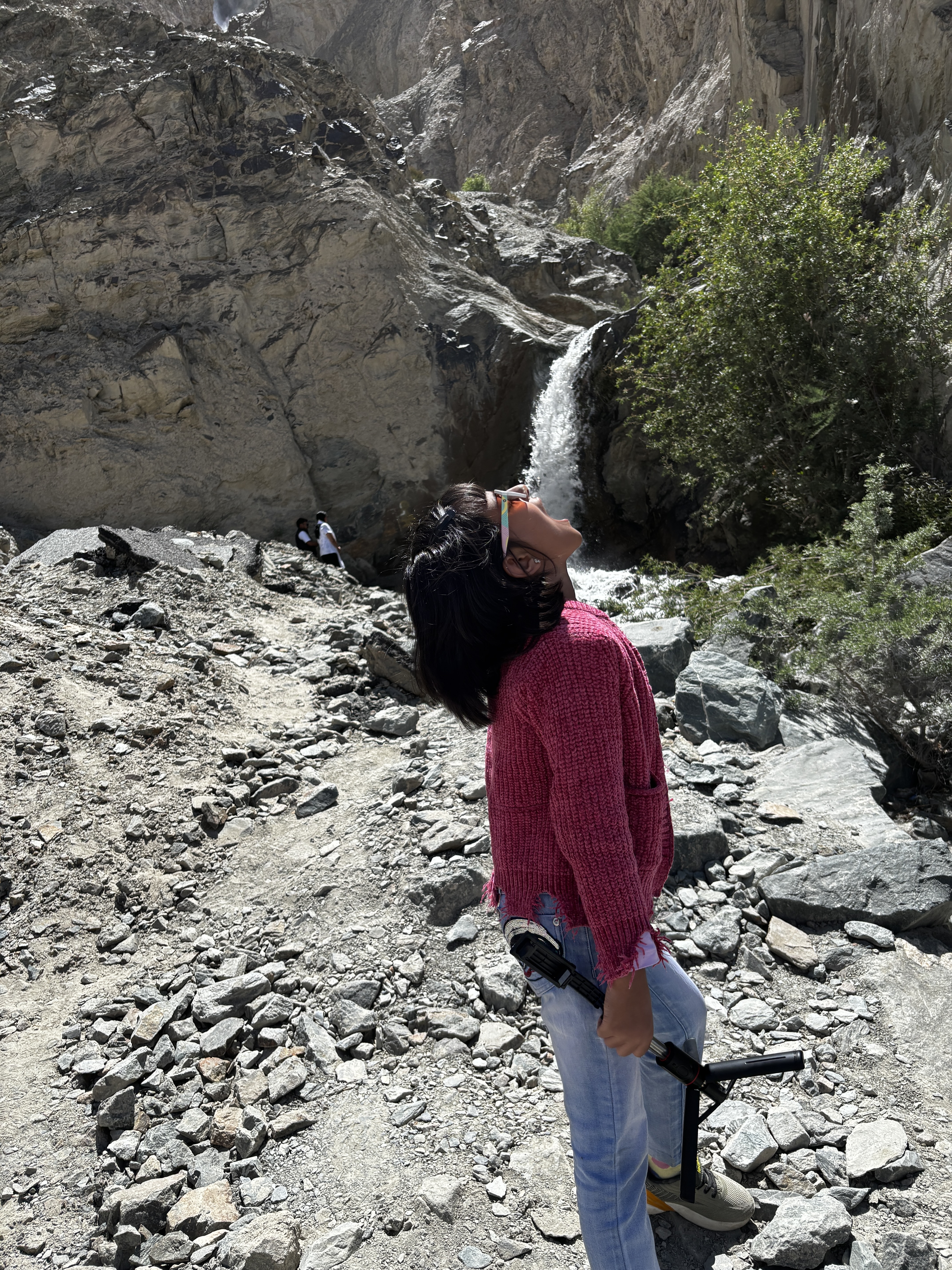 Posing with a waterfall to catch it in the mouth