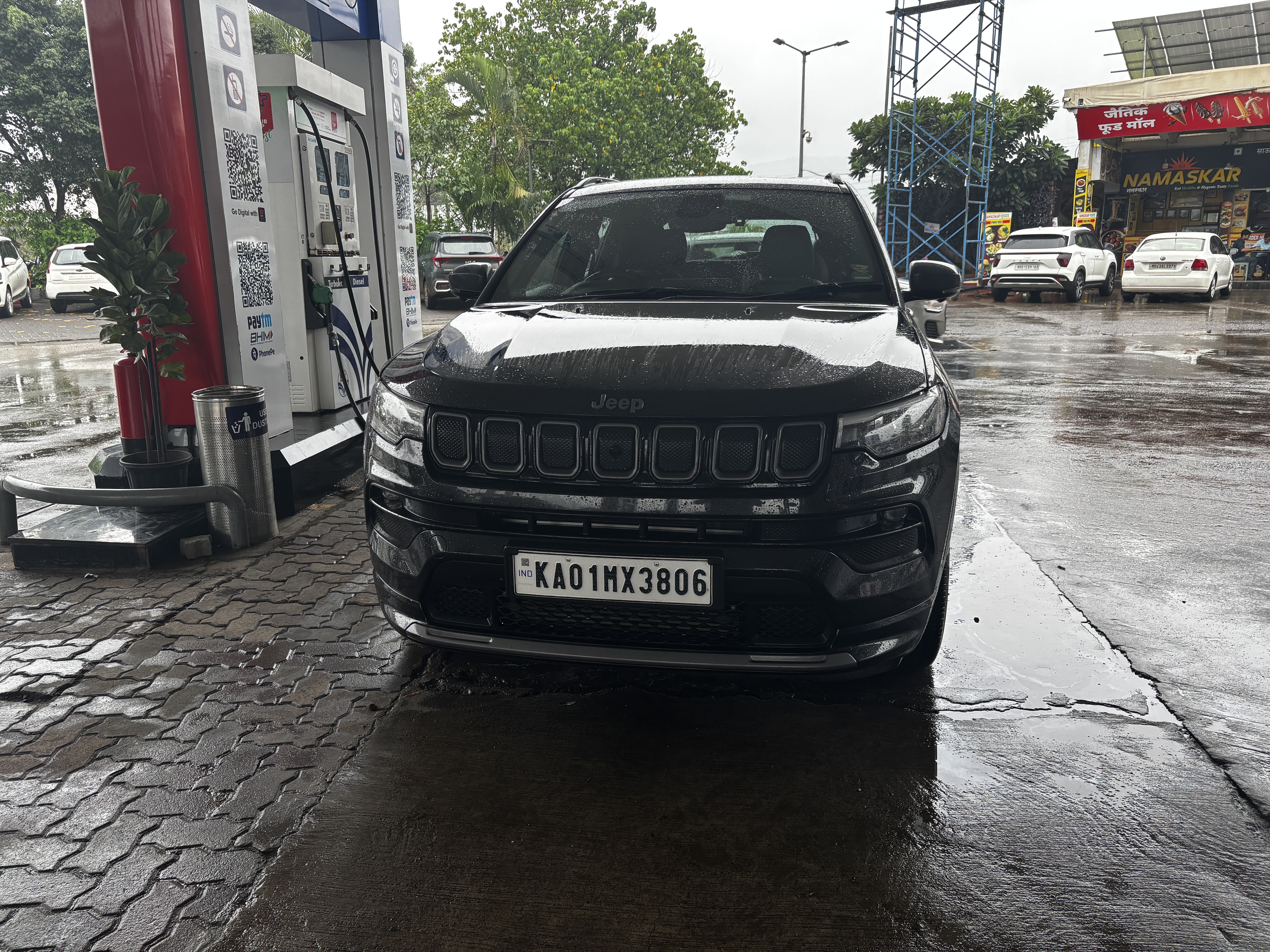 Fueling up the car on the way to Mumbai