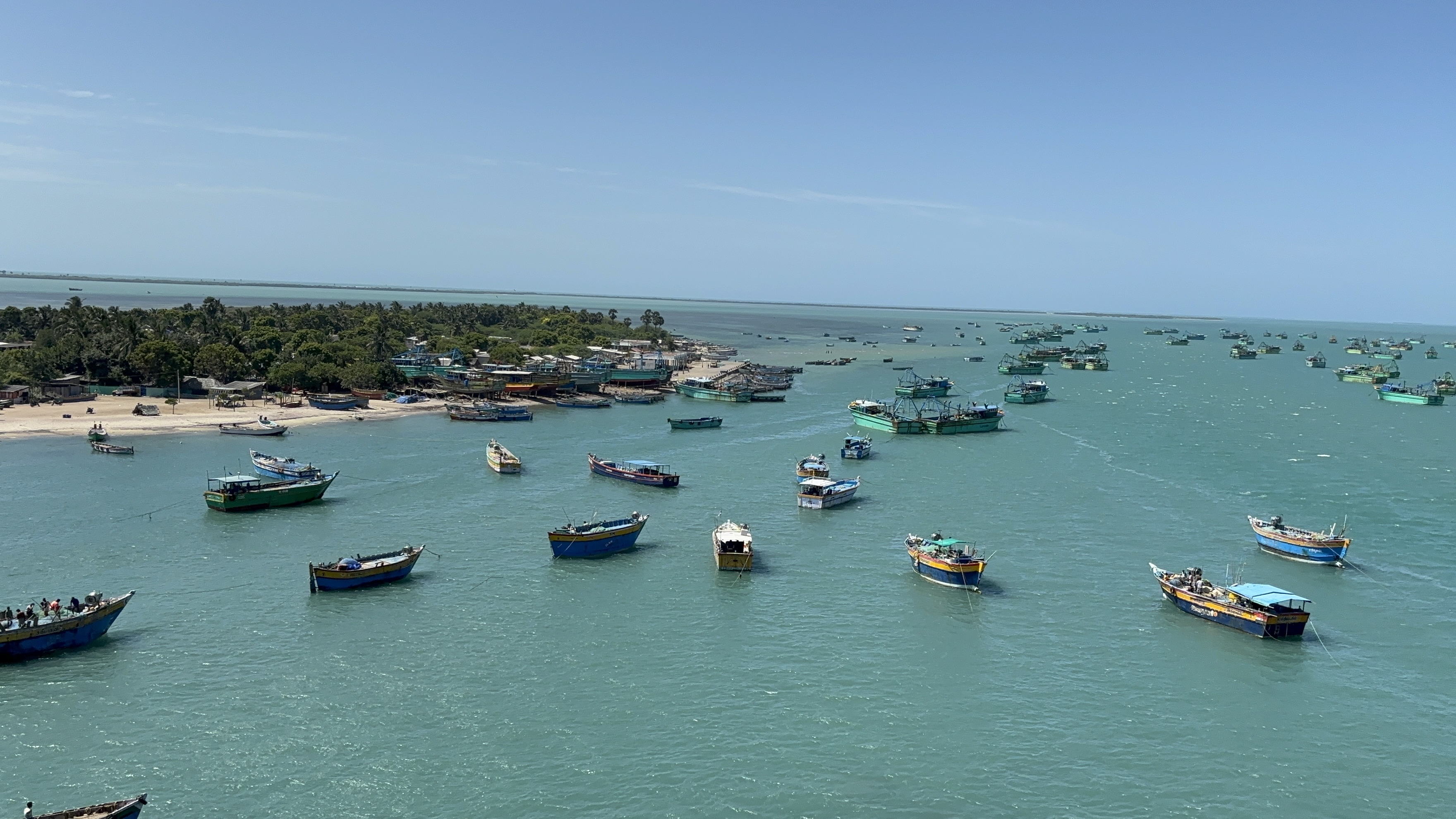 View from the pamban bridge on one of the sides. Full of colorful boats