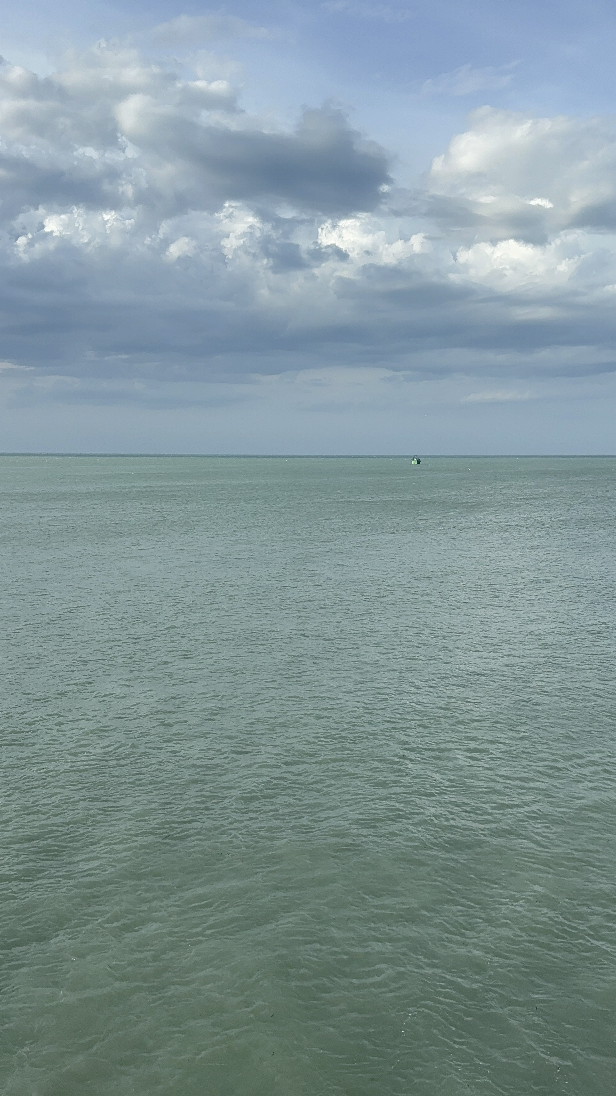 The view of the sea from the train bridge
