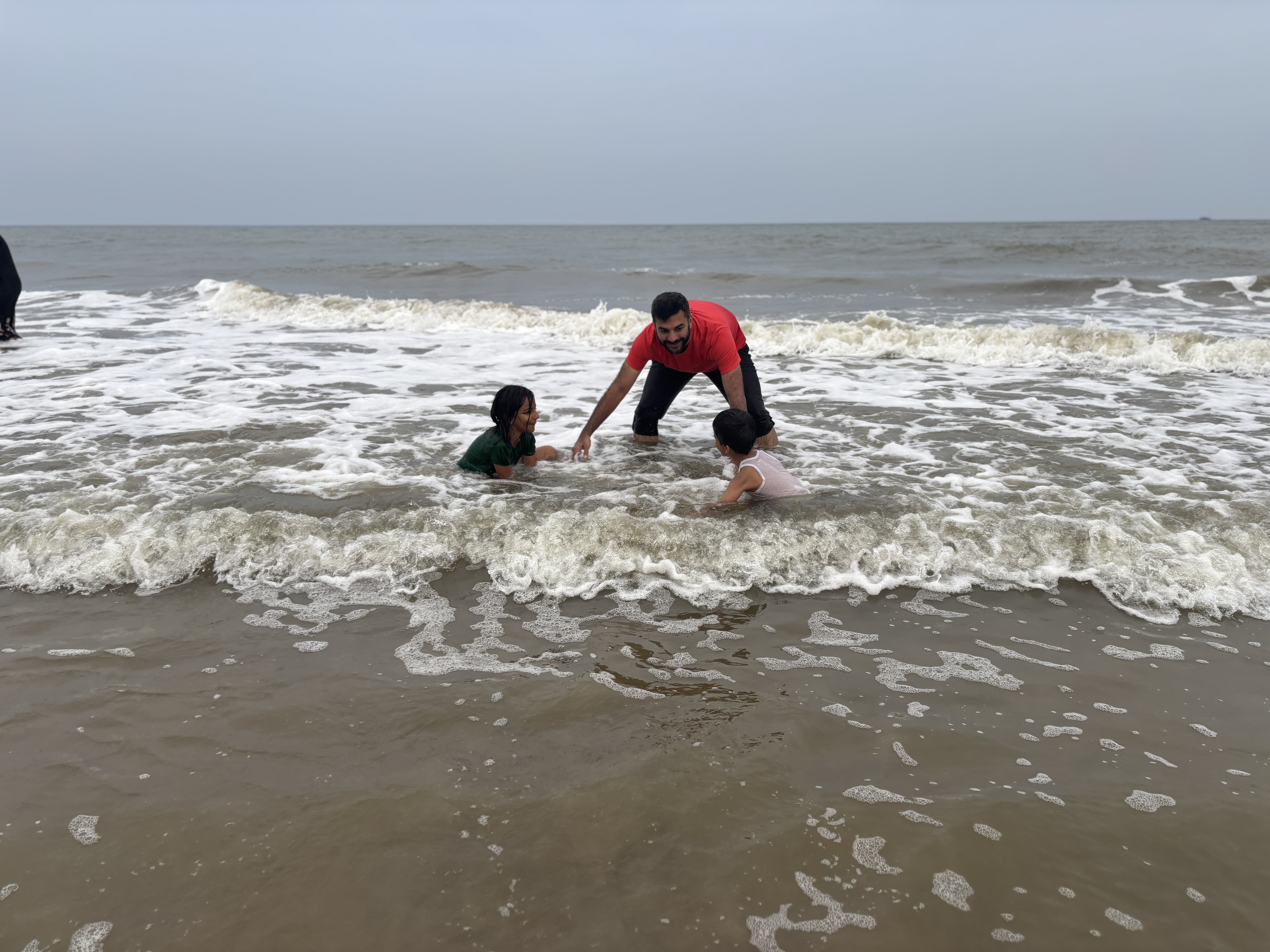 Playing at the sea in evening, in a cool evening