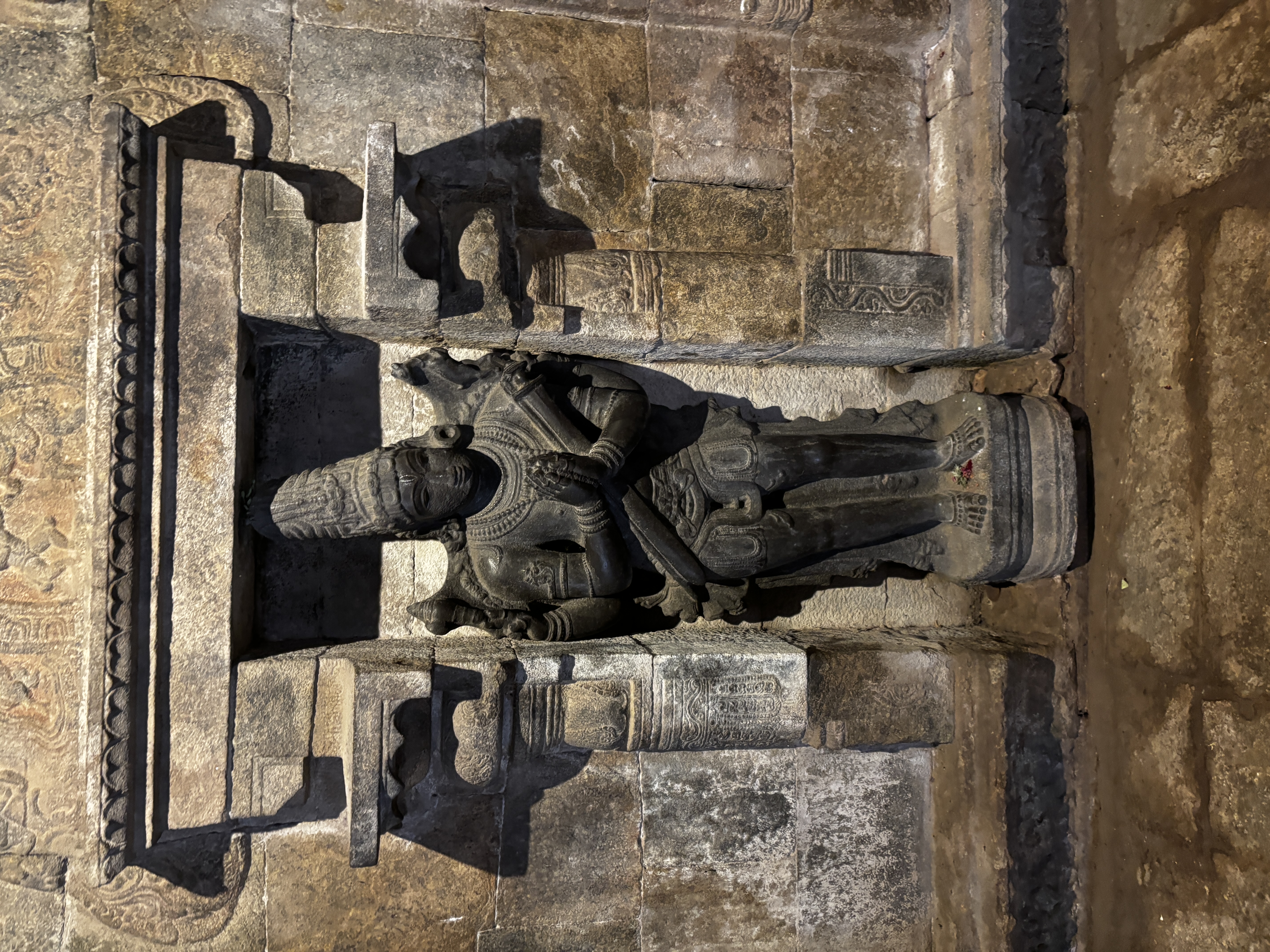 Murugan, Ganesh's brother. In south, he is bachelor and Ganesh is married while in North India it is assumed to be opposite